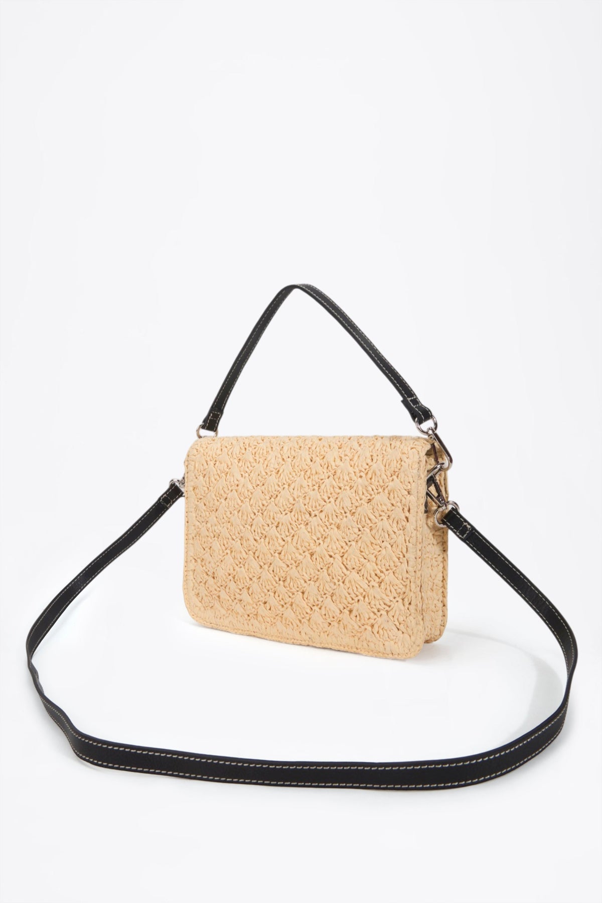 Paper yarn crossbody bag - logo patch close-up